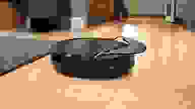 The iRobot Roomba Combo Max 10 retracting its mop