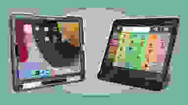 Two tablet-based AAC devices on a green background.
