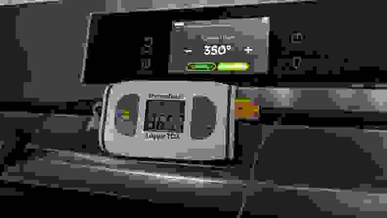 A ThermaData temperature reader attached to the oven door of the Frigidaire Gallery GCFI3060BF 30" Induction Range.