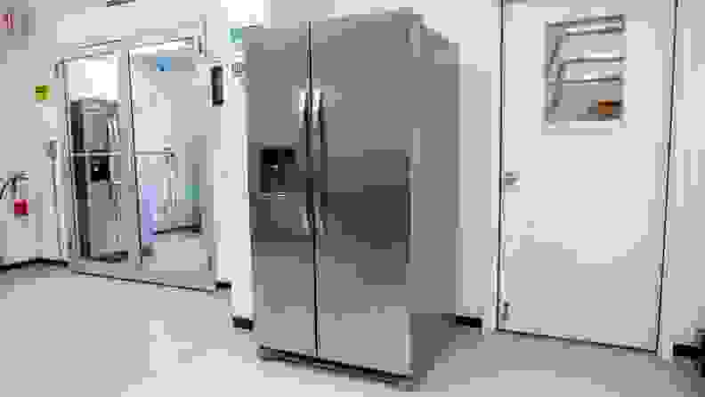 The Frigidaire FRSS2623AS side-by-side refrigerator sitting outside of our fridge testing labs.