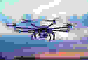 A drone flying in the sky.