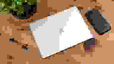 The Microsoft Surface Laptop on a wooden table