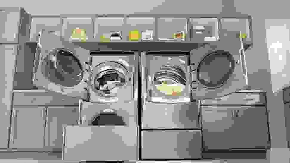 The LG WM9000 large capacity washing machine and dryer are shown in a model room.