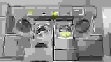 The LG WM9000 large capacity washing machine and dryer are shown in a model room.
