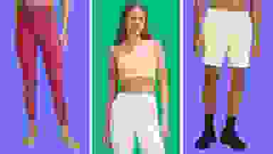 A collection of lululemon clothes in front of colored backgrounds.