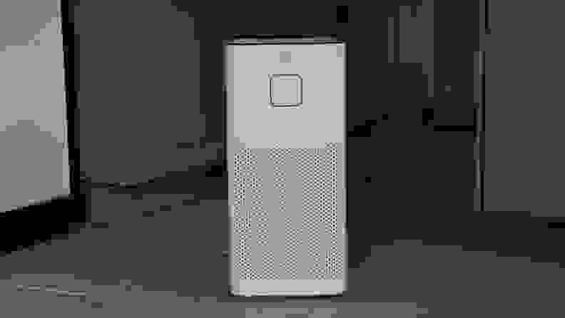 A Medify MA-50 air purifier sits on a carpet.