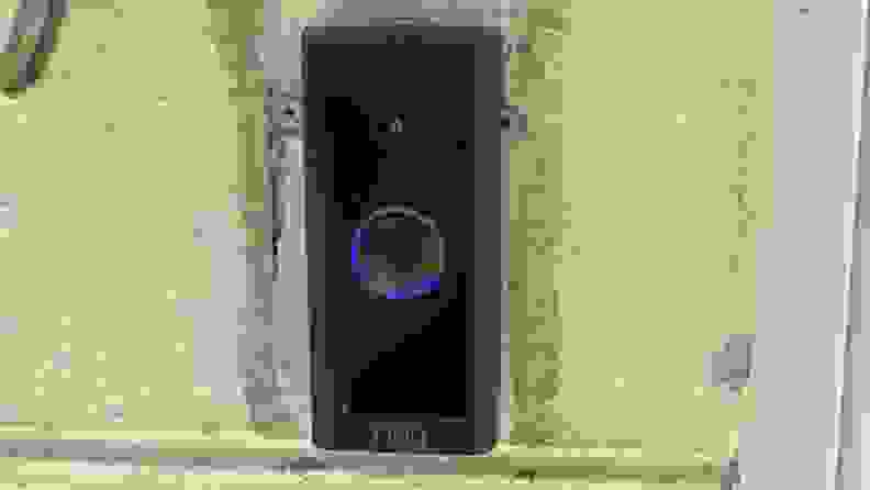 The Ring Video Doorbell Wired is installed on the front of a home.