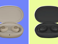Cream and black pair of Jabra Enahnce Plus earbuds in their cases.