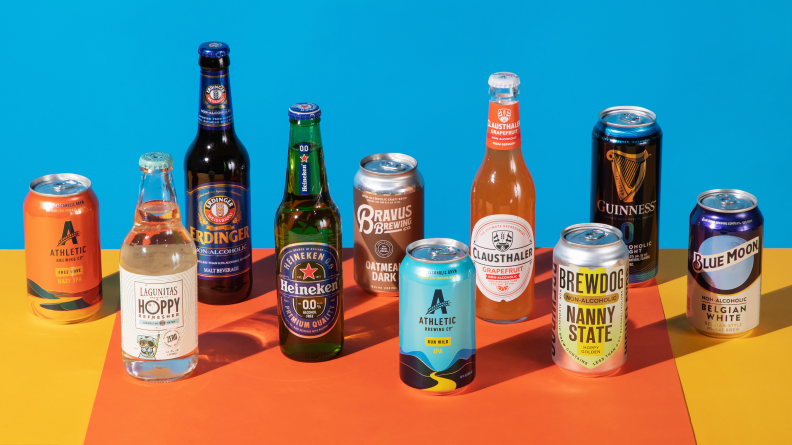Several bottles and cans of nonalcoholic beer on a colorful background