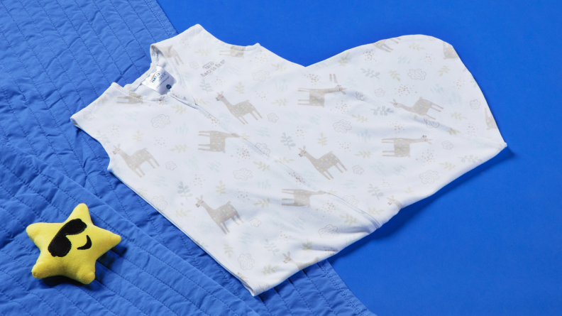 The Halo sleep sack on a blue background