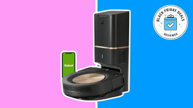 An iRobot Roomba s9+ on a pink and blue background