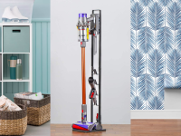 A storage container; a vacuum stand; and stick-and-peel wallpaper.